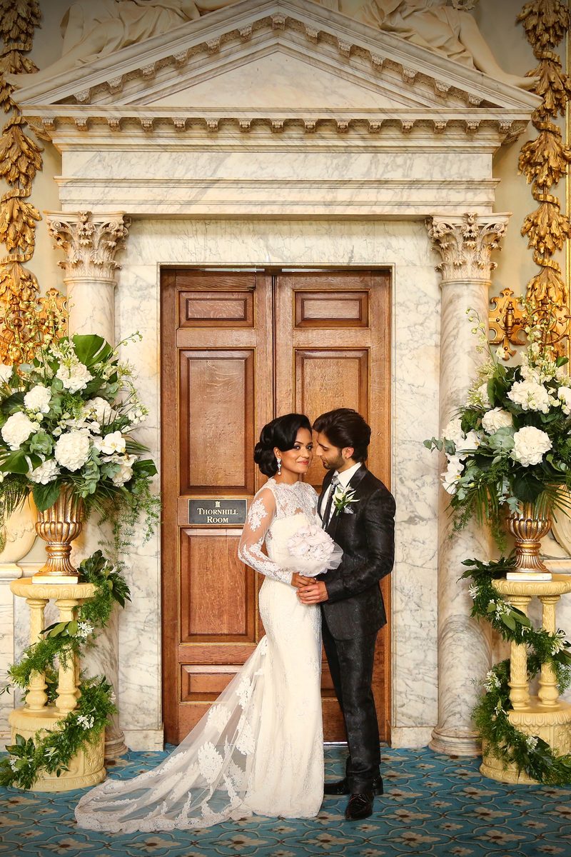 Couple photographed at a winter wedding in soft afternoon light